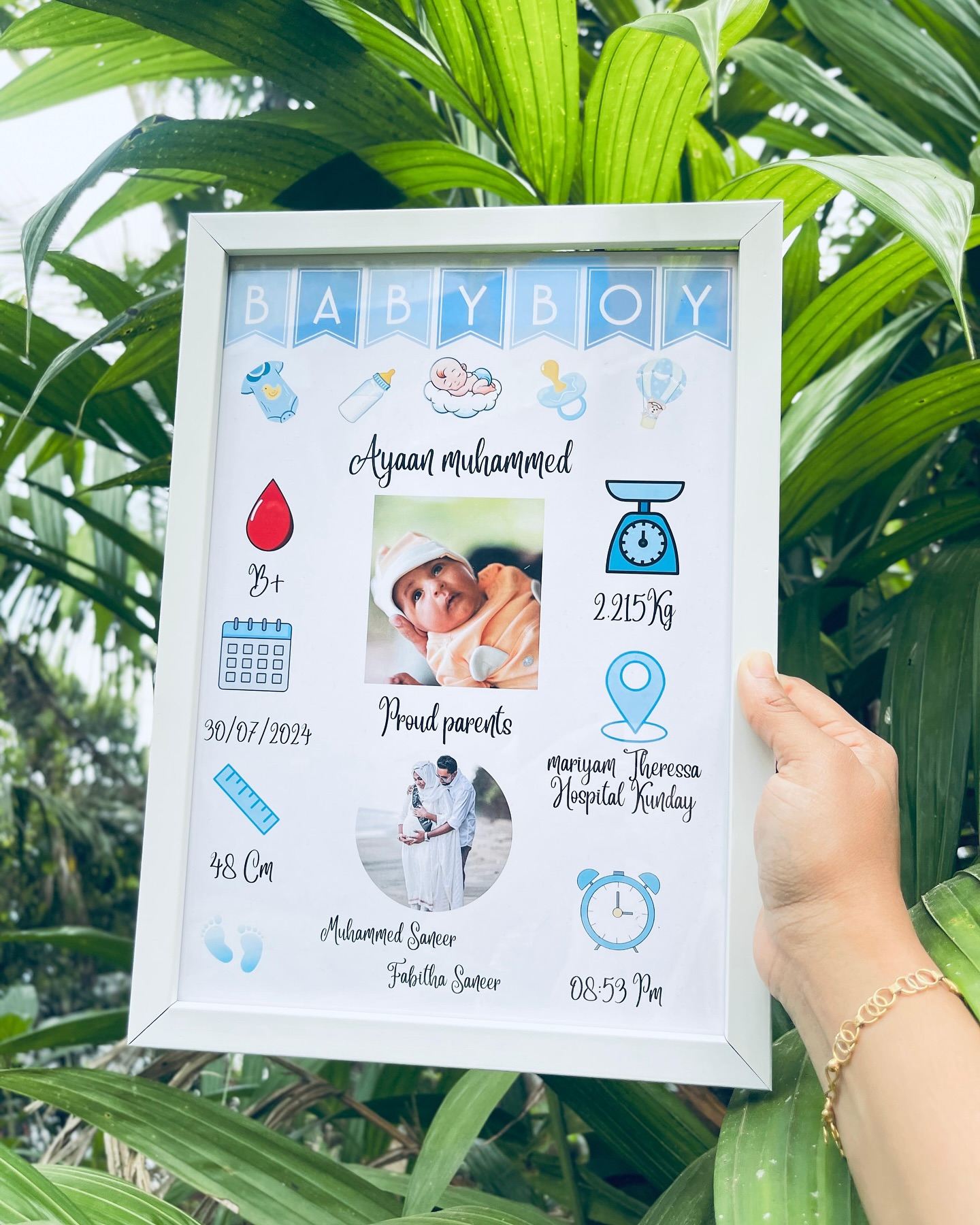A personalized birth announcement frame capturing your baby boy's name, weight, length and proud parents' photos.