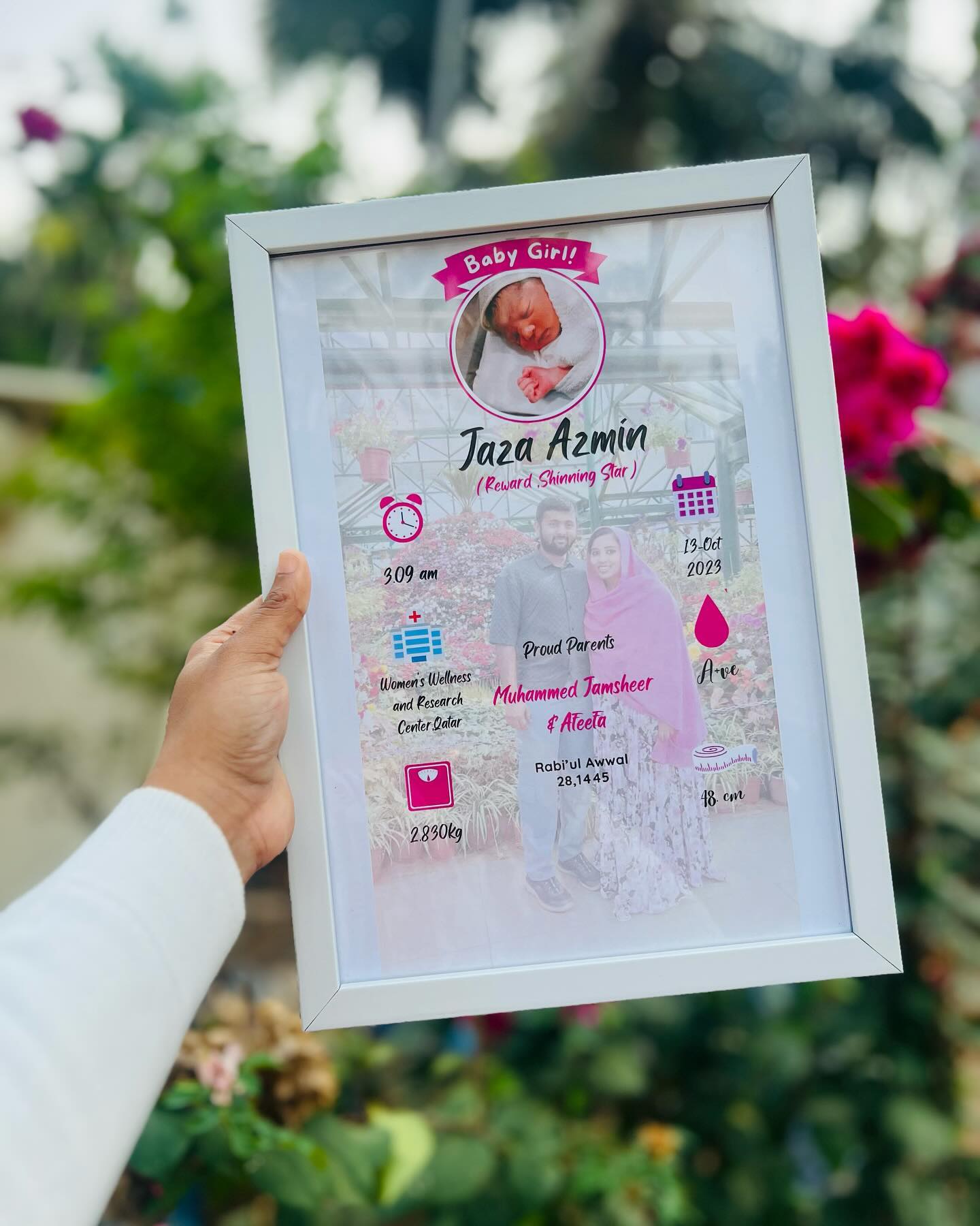 A personalized newborn milestone frame capturing baby's name, birth stats, and proud parents' photo.