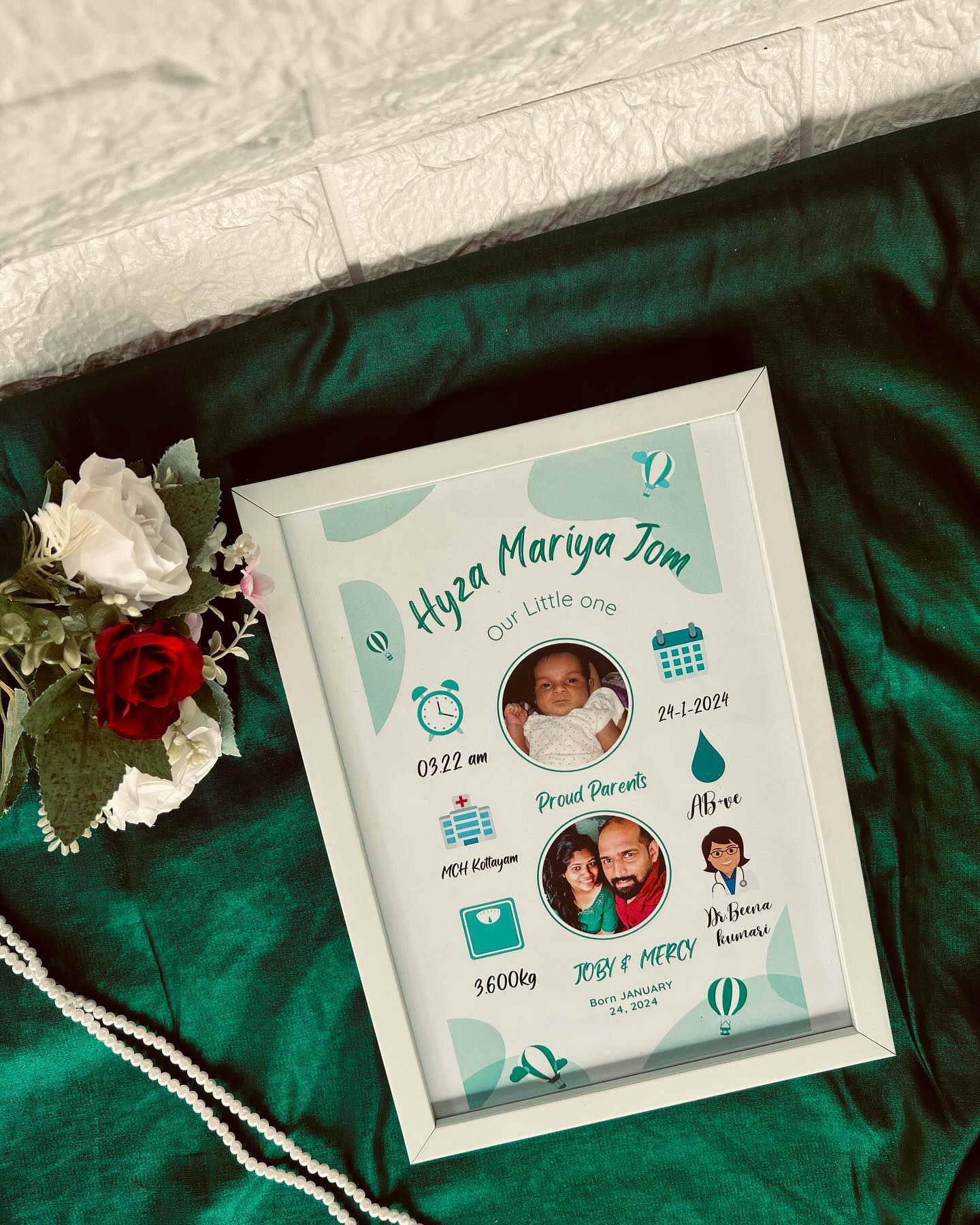 A keepsake frame that captures your newborn's first details and proud-parent photo in soft mint tones.