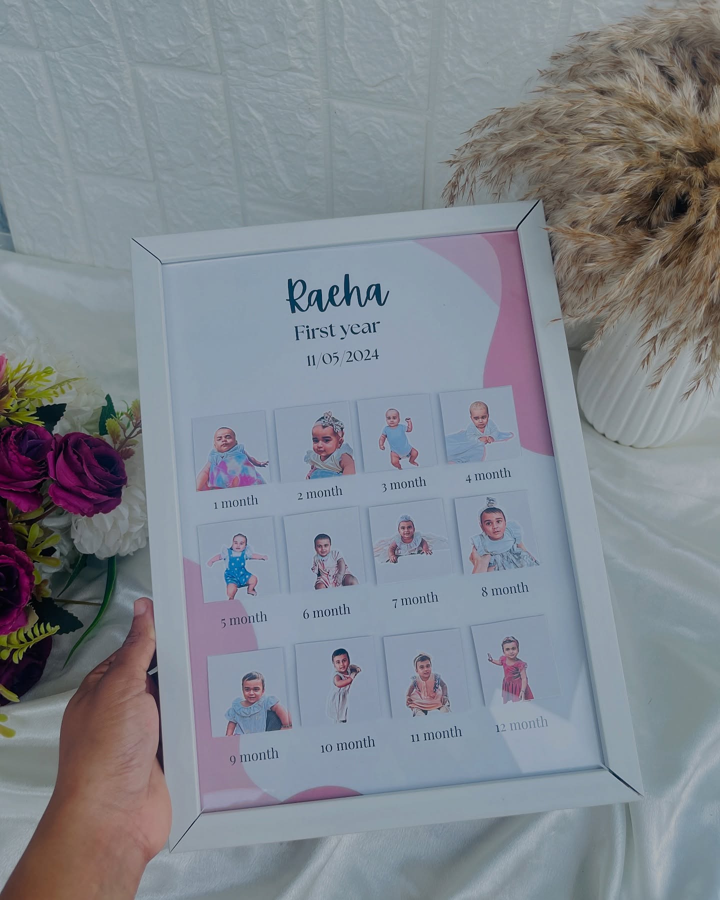 A month-by-month photo grid frame charting baby Raeha's first year, from 1 to 12 months.