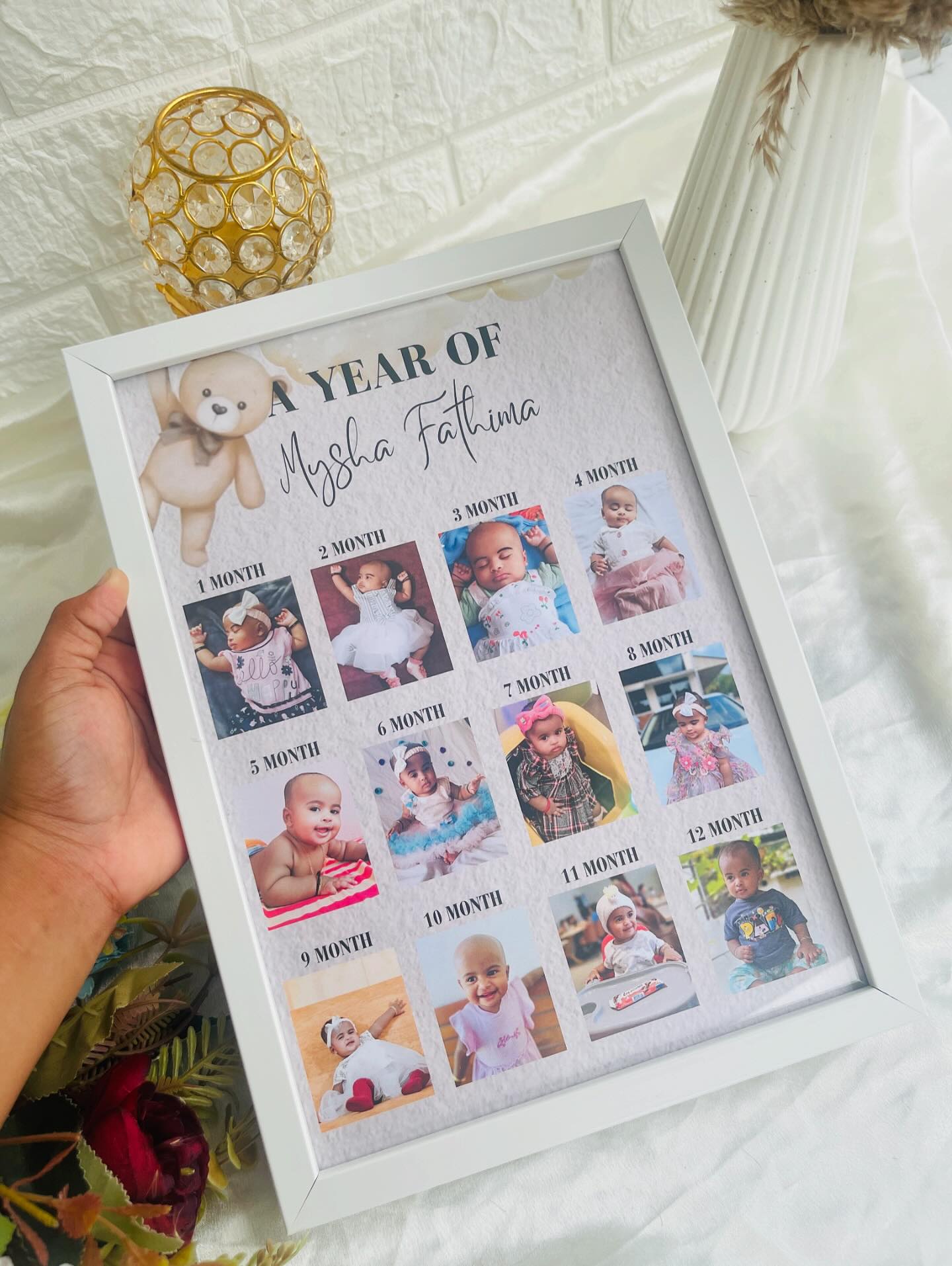 A personalized 'A Year Of' framed collage capturing a baby's month-by-month photos through their first year.