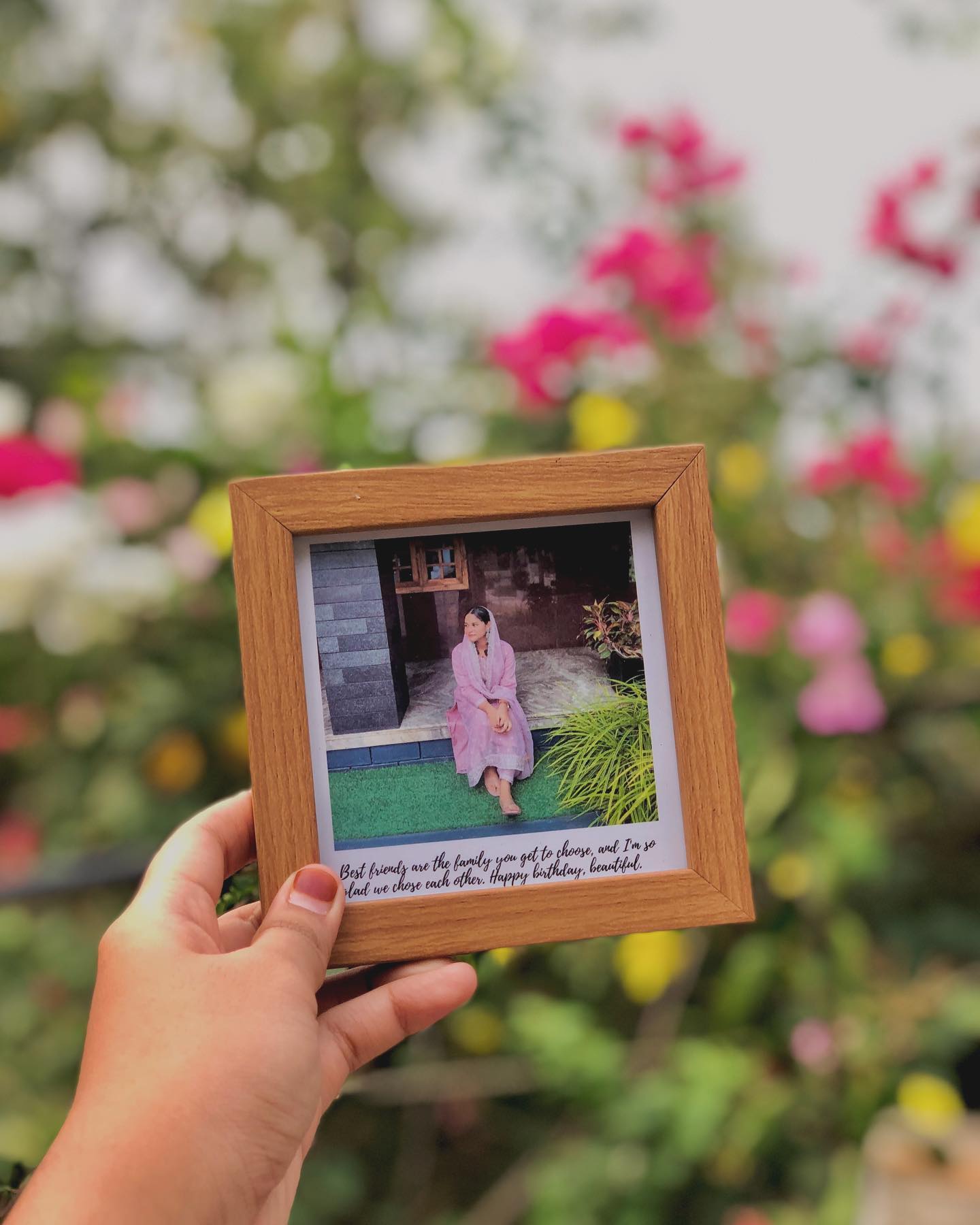 A wooden polaroid-style frame pairing a personal photo with a heartfelt handwritten birthday message.
