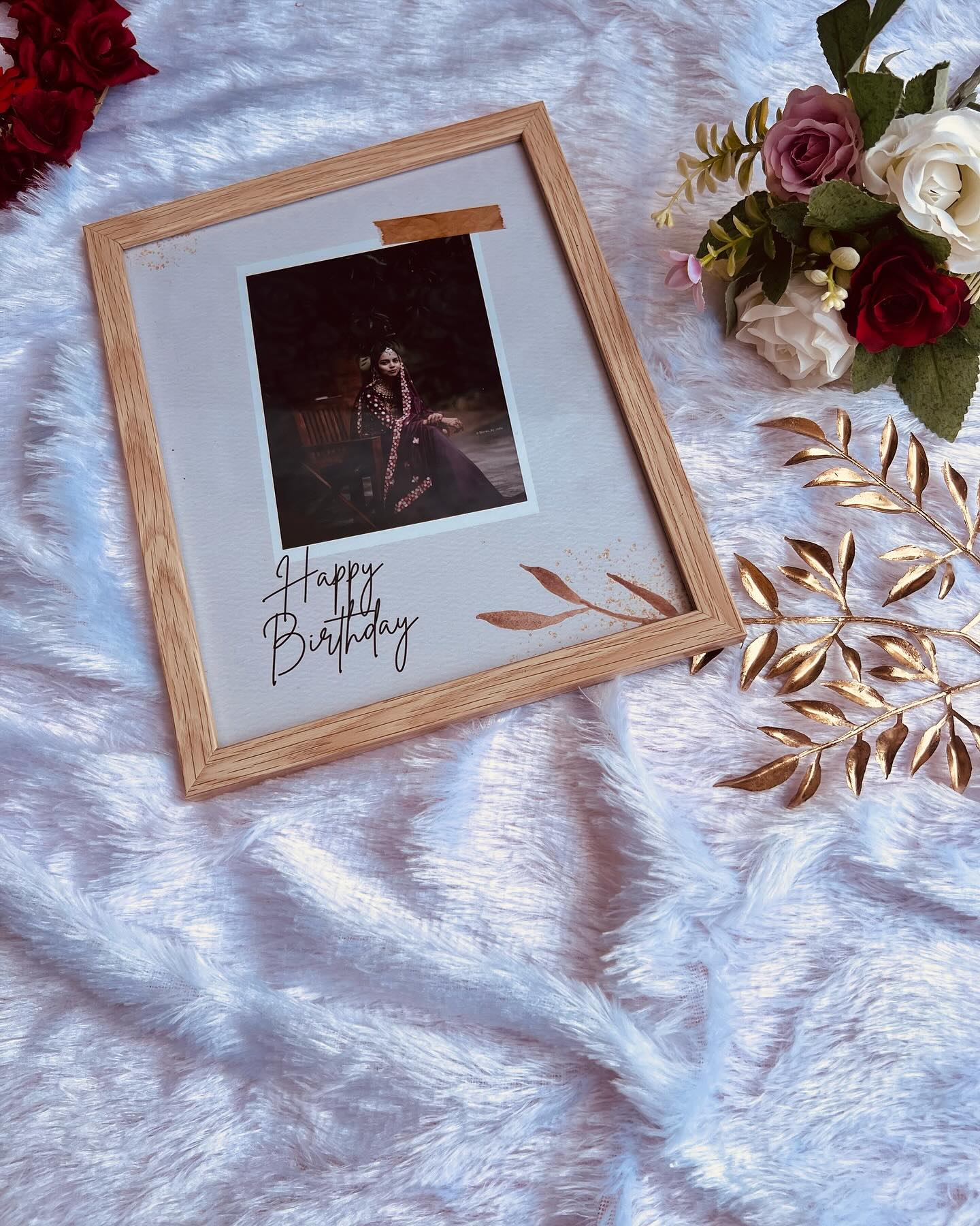 A wooden-framed birthday keepsake showcasing a treasured bridal portrait with a handwritten Happy Birthday note.