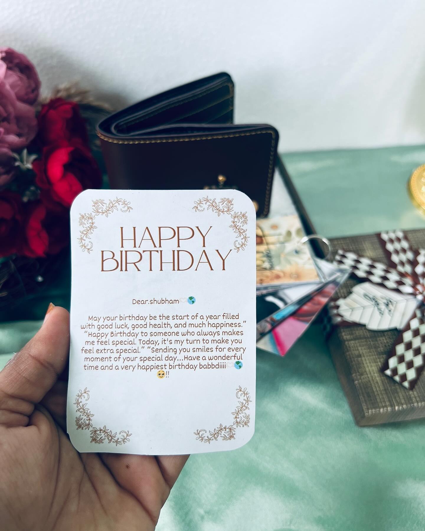 A textured gift box wrapped with a brown-and-white checkered ribbon bow and a handwritten 'For You' tag.