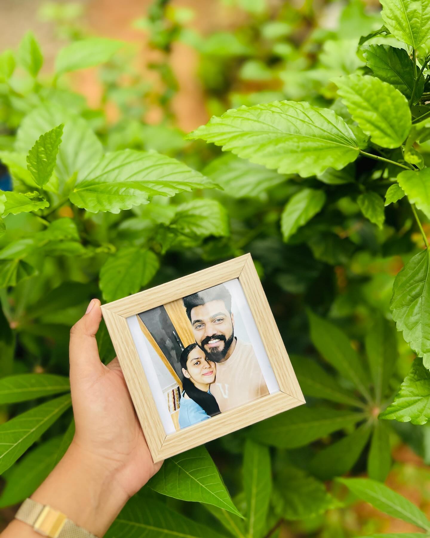 A light wood mini photo frame personalized with your favourite couple photo, a sweet little keepsake gift.