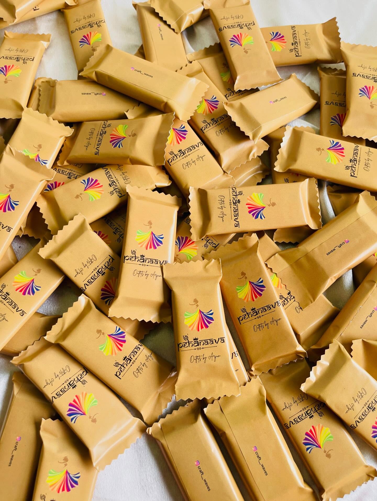 Bulk custom-wrapped chocolate favor bars printed with your brand or event logo, ideal for corporate or event giveaways.