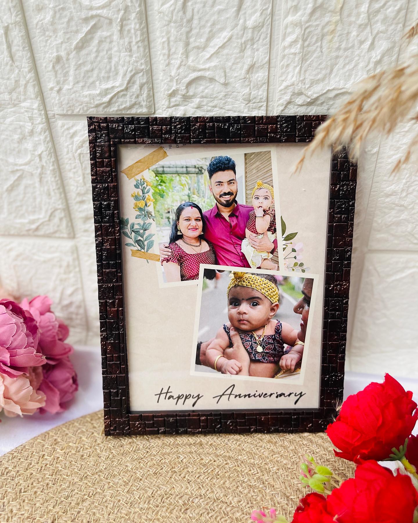 A scrapbook-style photo frame layering family portraits with a warm Happy Anniversary message.