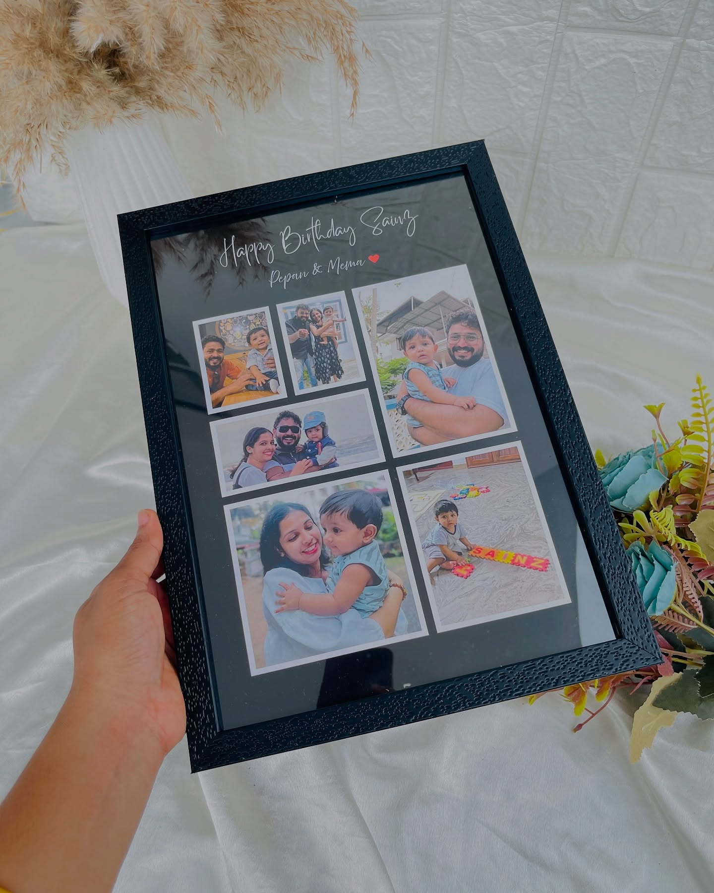 A multi-photo collage frame personalized with a child's name and cherished family moments.