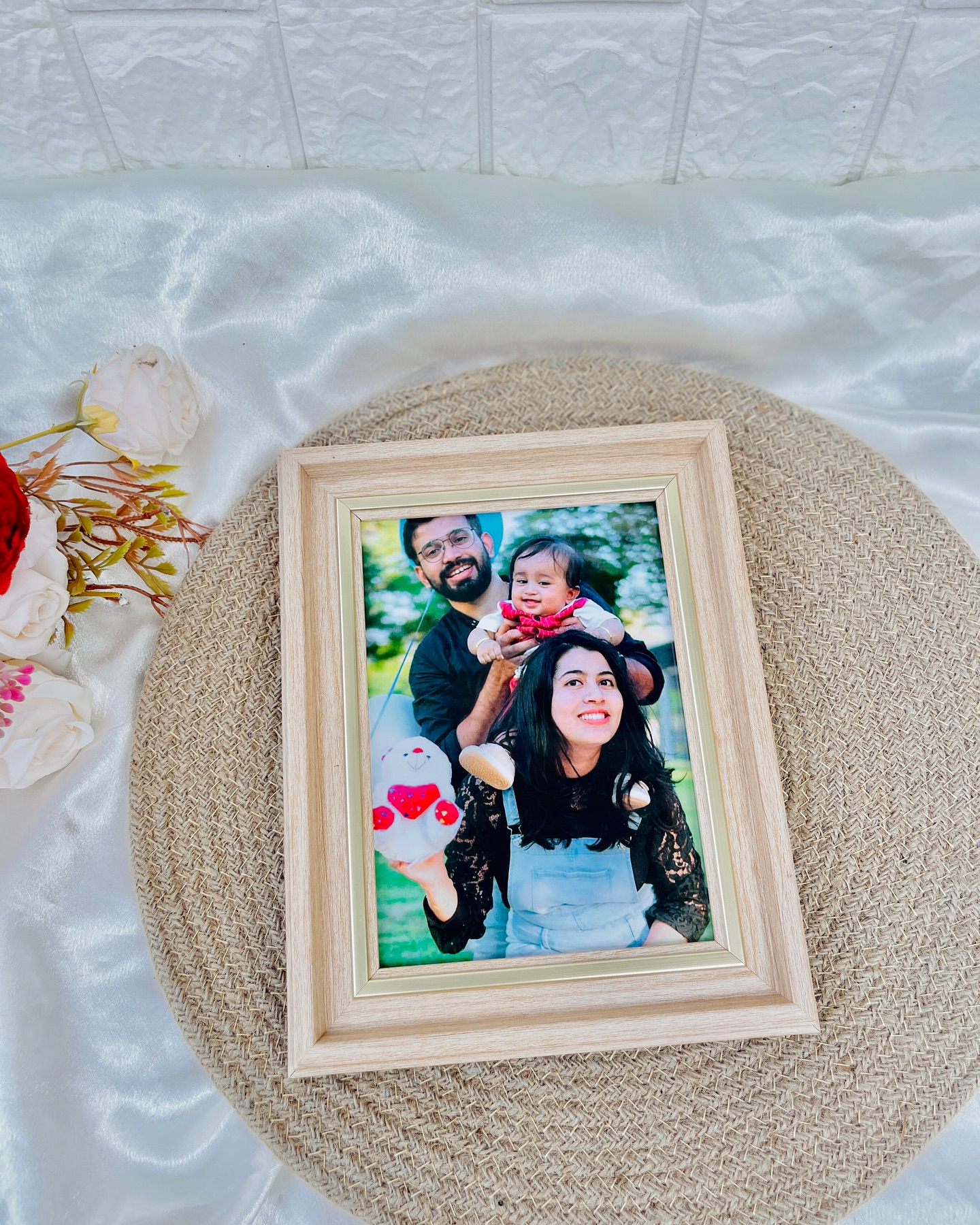 A personalized wooden photo frame capturing a joyful family memory.