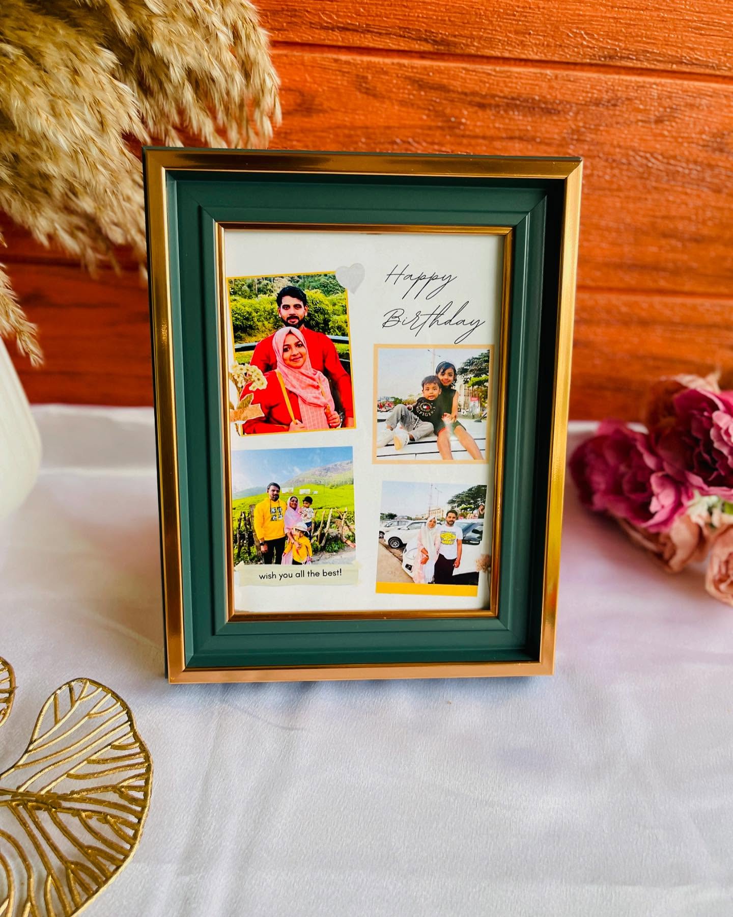 A gold-trimmed green frame arranged with multiple family photos and a handwritten Happy Birthday note.