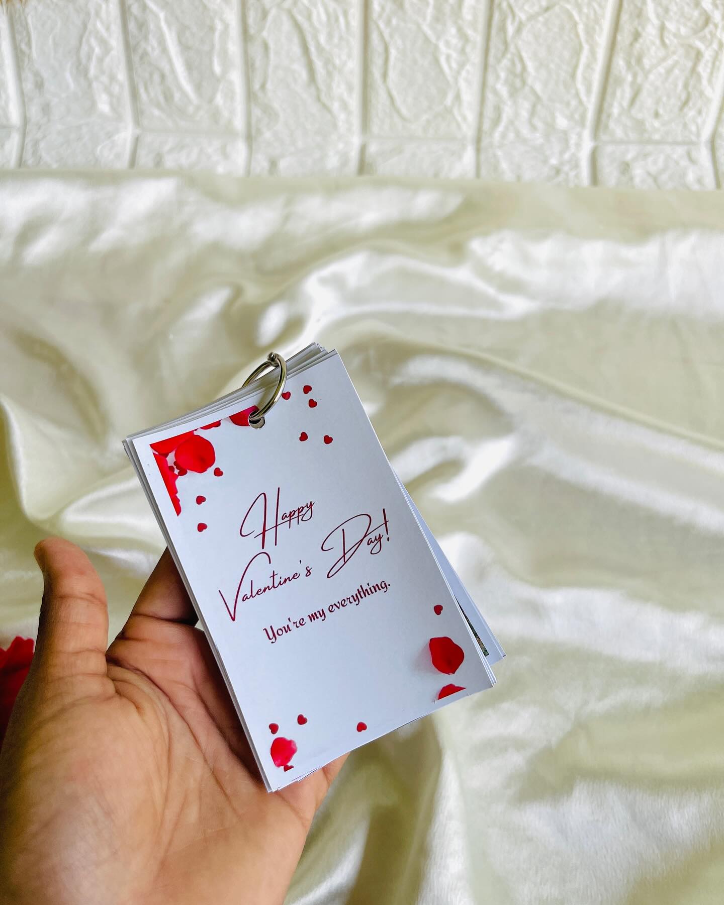 A ring-bound mini flip book of heartfelt Valentine's messages, one card for every reason to love them.