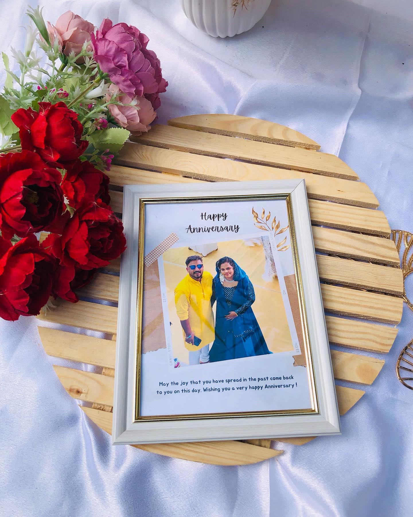 A personalized Polaroid-style anniversary photo frame with a custom couple photo and heartfelt message.