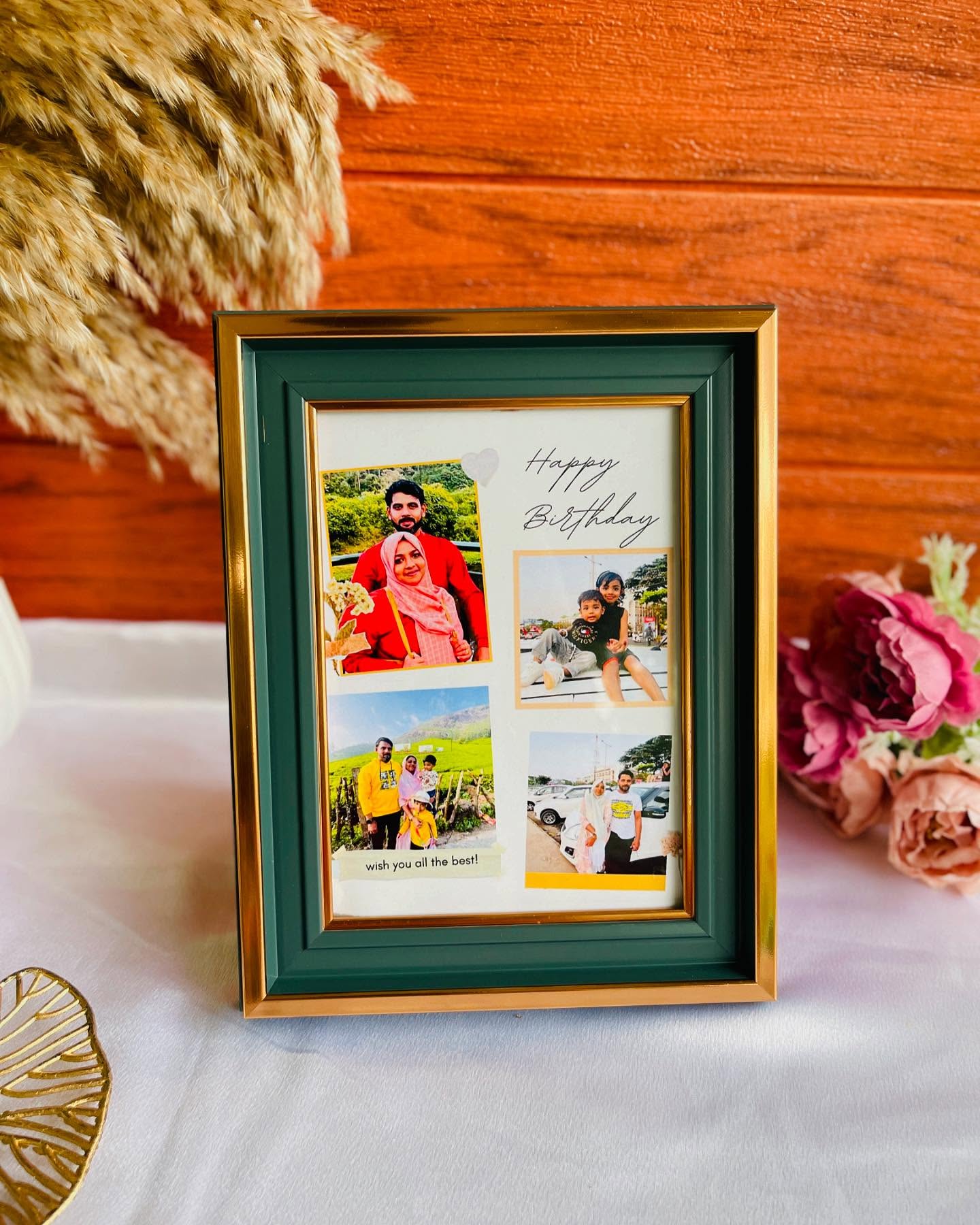 A green and gold photo frame featuring a personalized four-photo family collage with a "Happy Birthday" message.