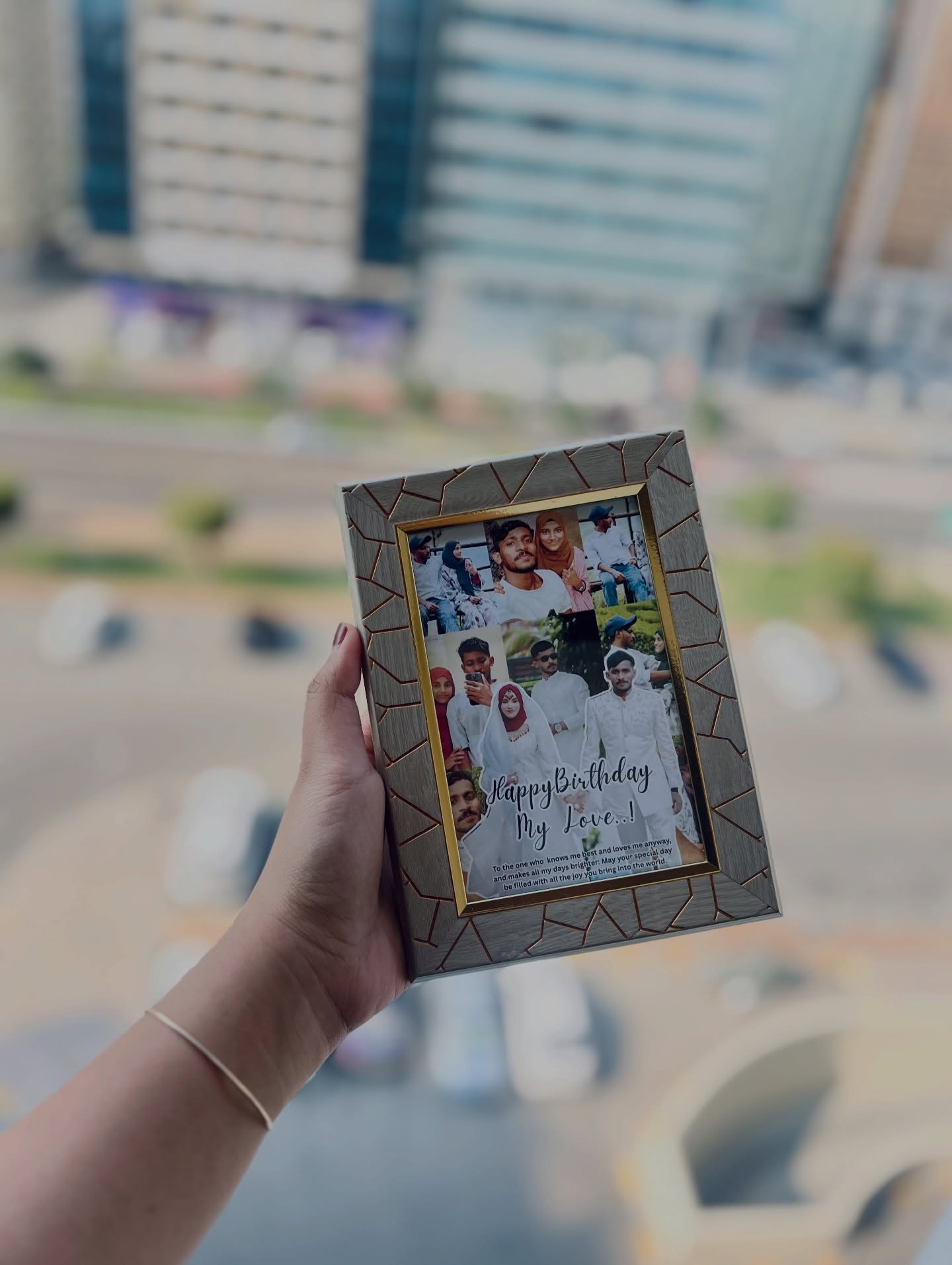 A textured photo frame filled with couple photos and a personalized 'Happy Birthday My Love' message.