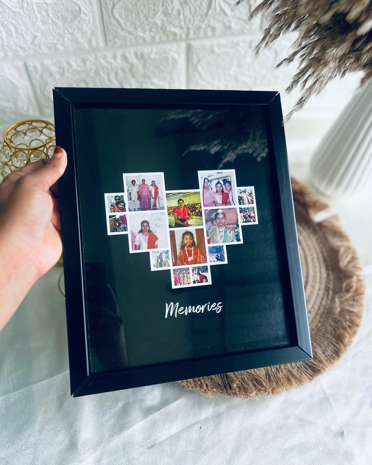 A black-framed heart-shaped photo collage captioned "Memories".