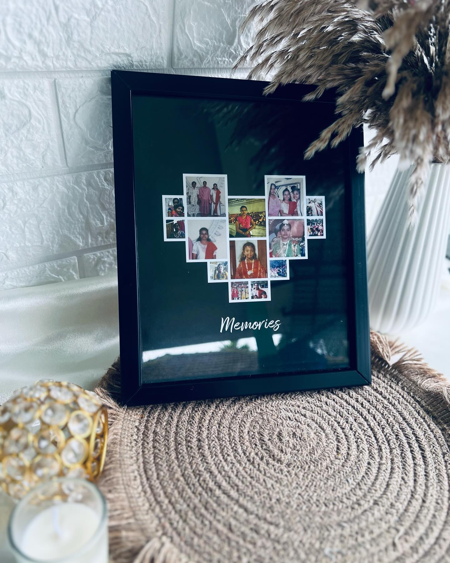 A personalized heart-shaped photo collage framed in black, printed with 'Memories' for a cherished keepsake.