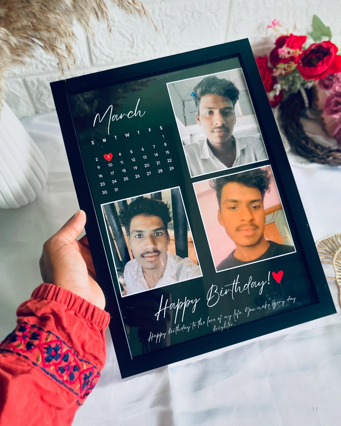 A framed personalized photo calendar with three custom photos and a "Happy Birthday" message.