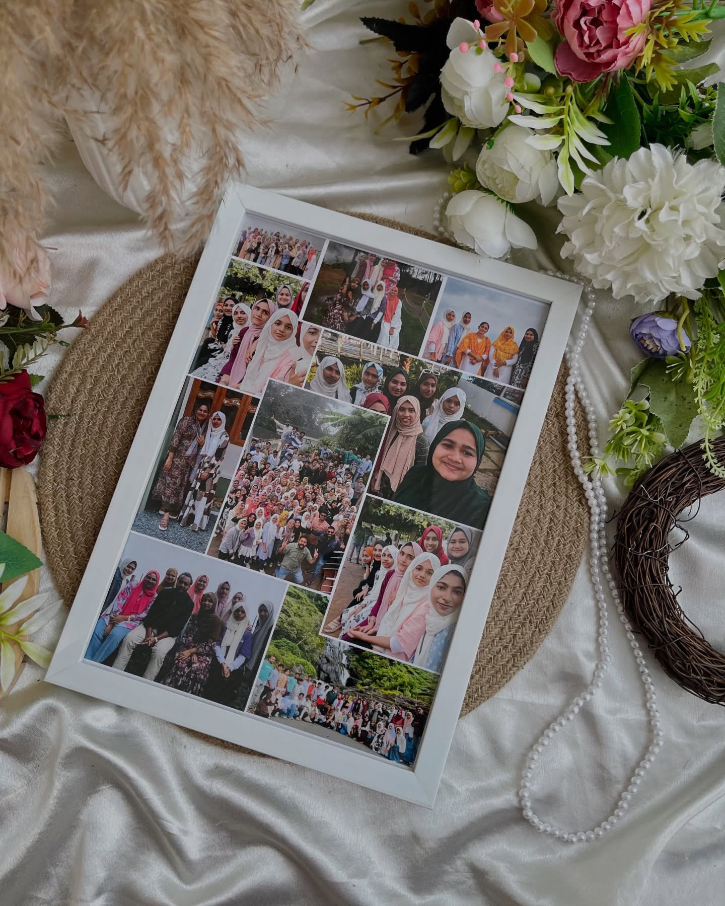 A large multi-photo collage frame bringing together dozens of cherished group memories into one keepsake display.