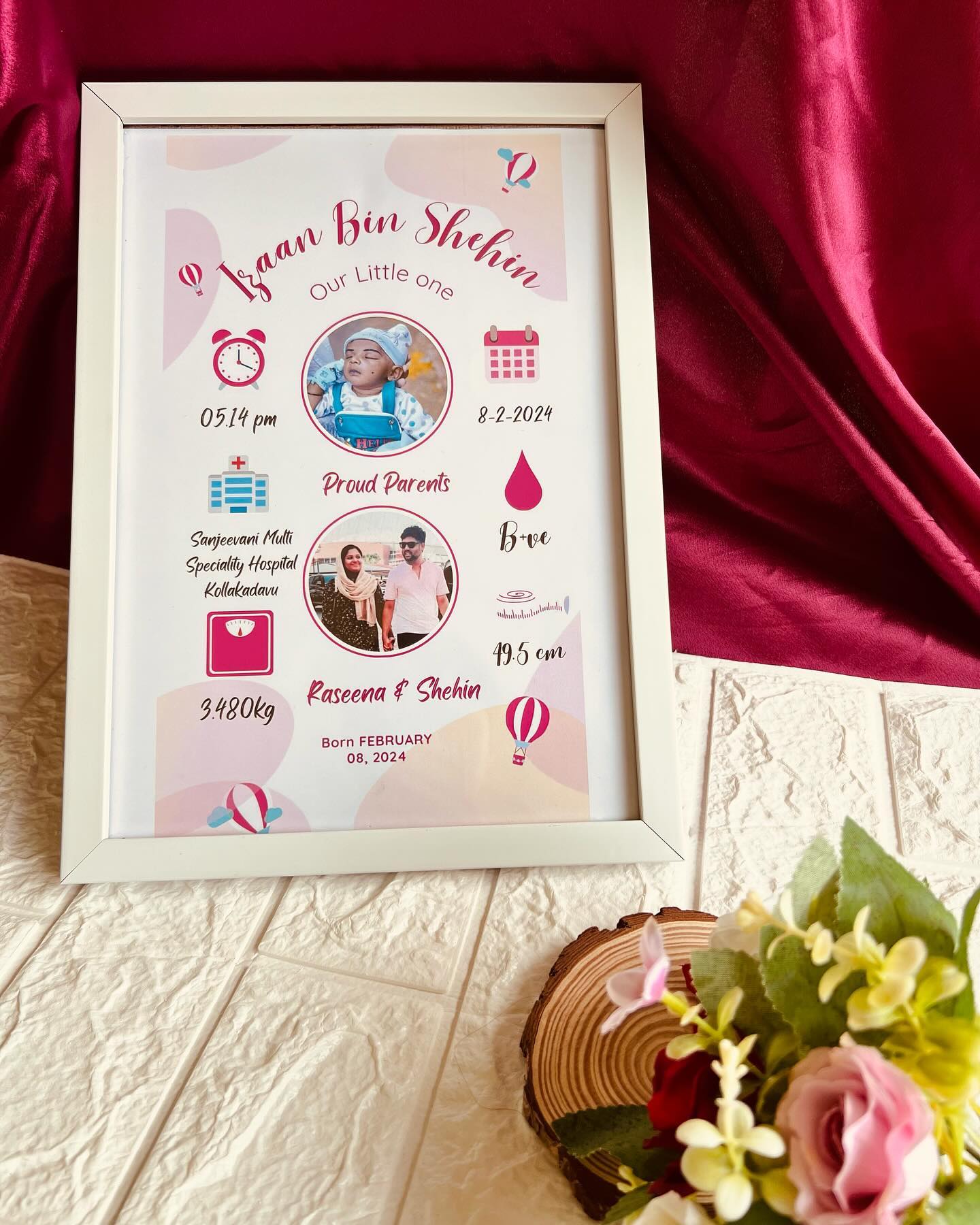 A personalized framed birth announcement poster capturing baby's name, stats, and proud parents' photo.