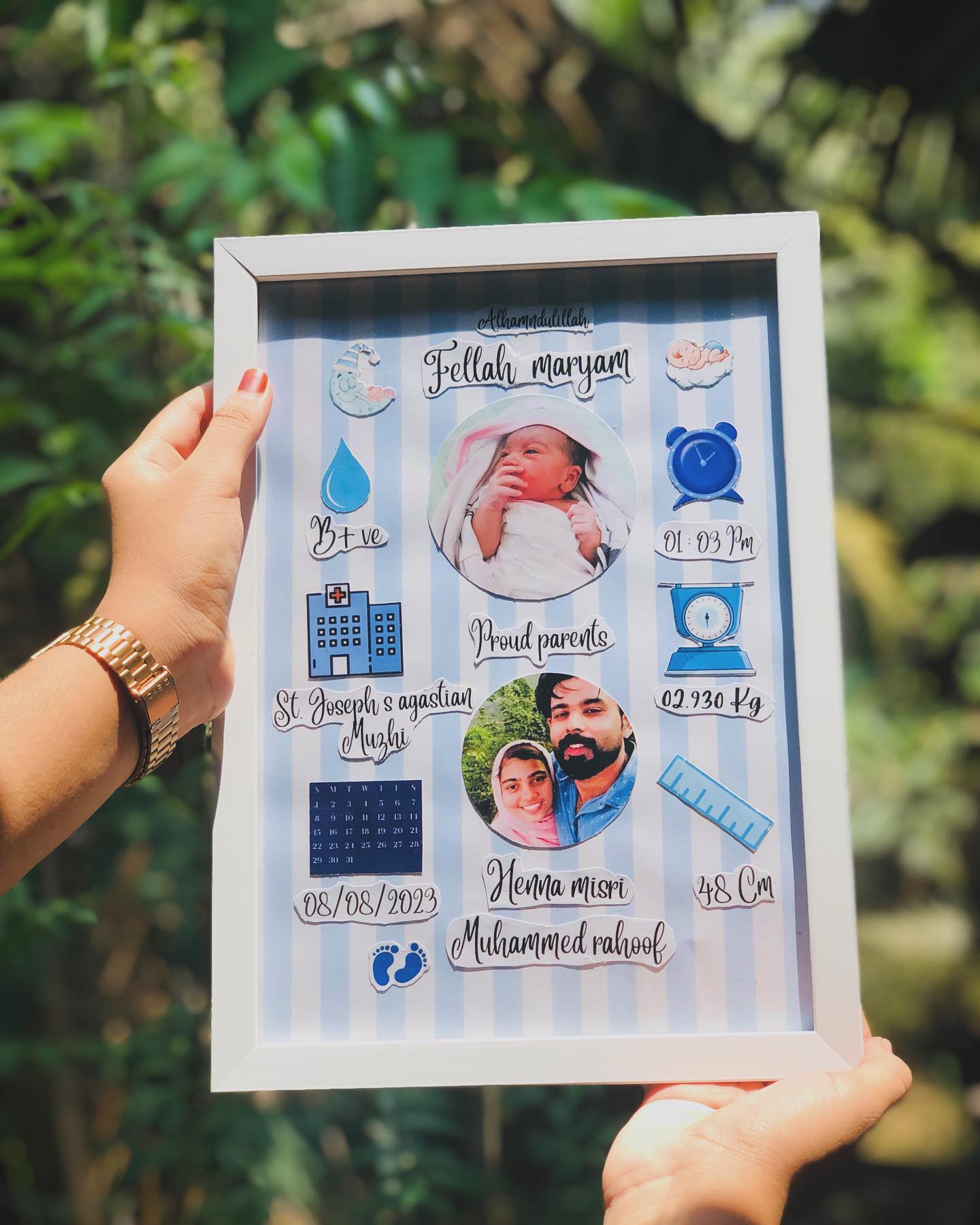A personalized newborn milestone frame capturing baby and parent photos with birth details.
