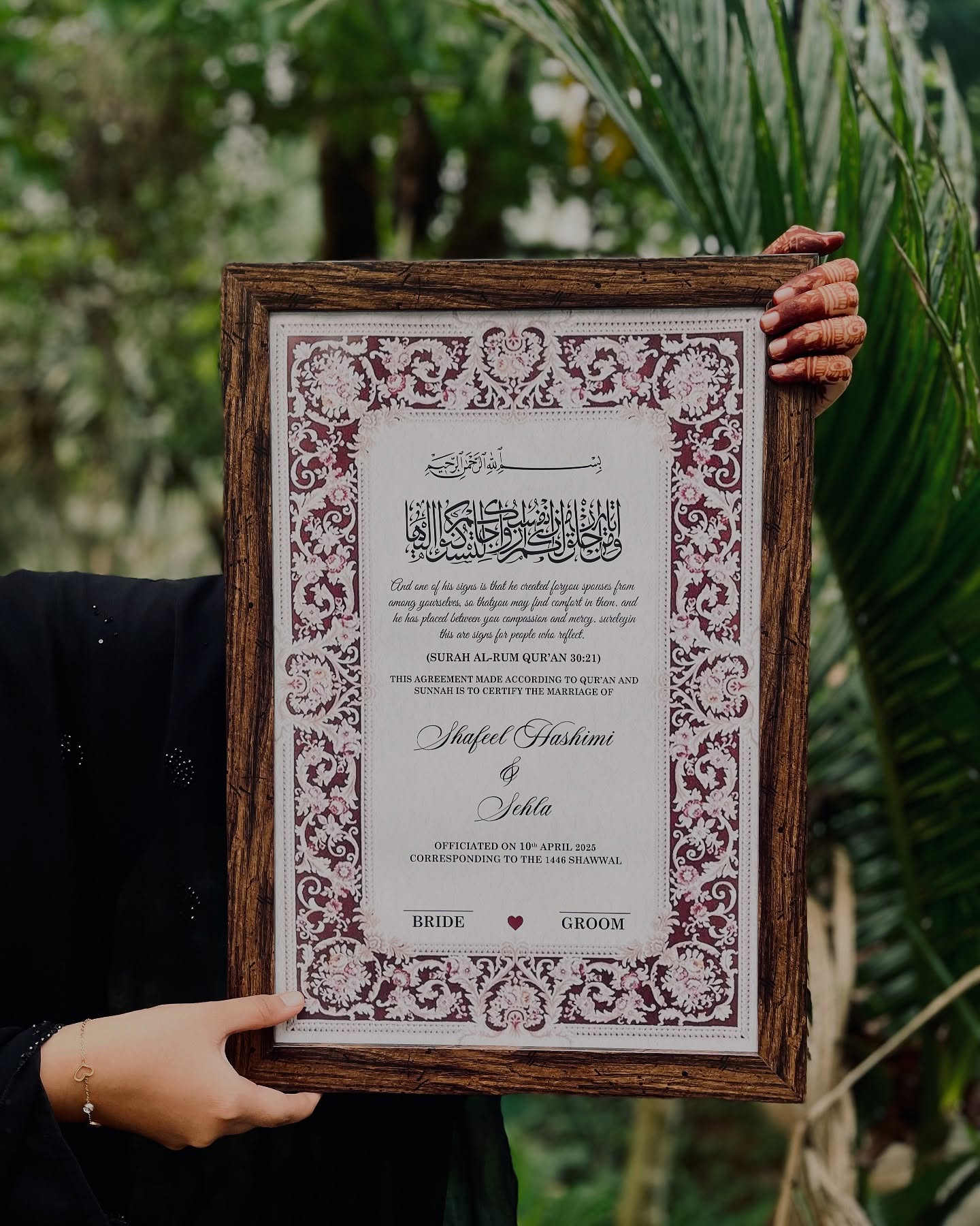 A framed, personalized Nikkah certificate printed with names, date, and a Quranic verse as a wedding keepsake.