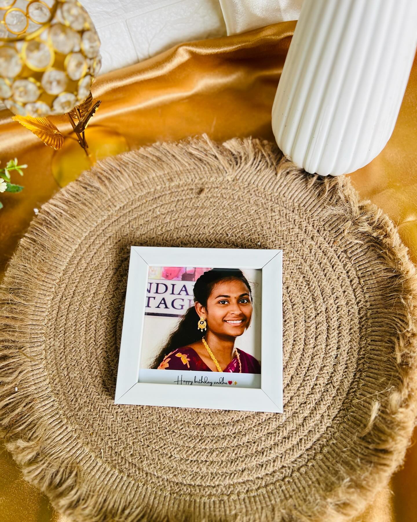 A compact white photo frame printed with a personal photo and a custom birthday message.