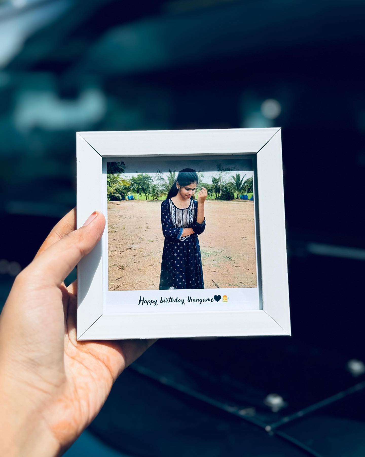A custom framed photo with a handwritten-style birthday message, ready to gift.