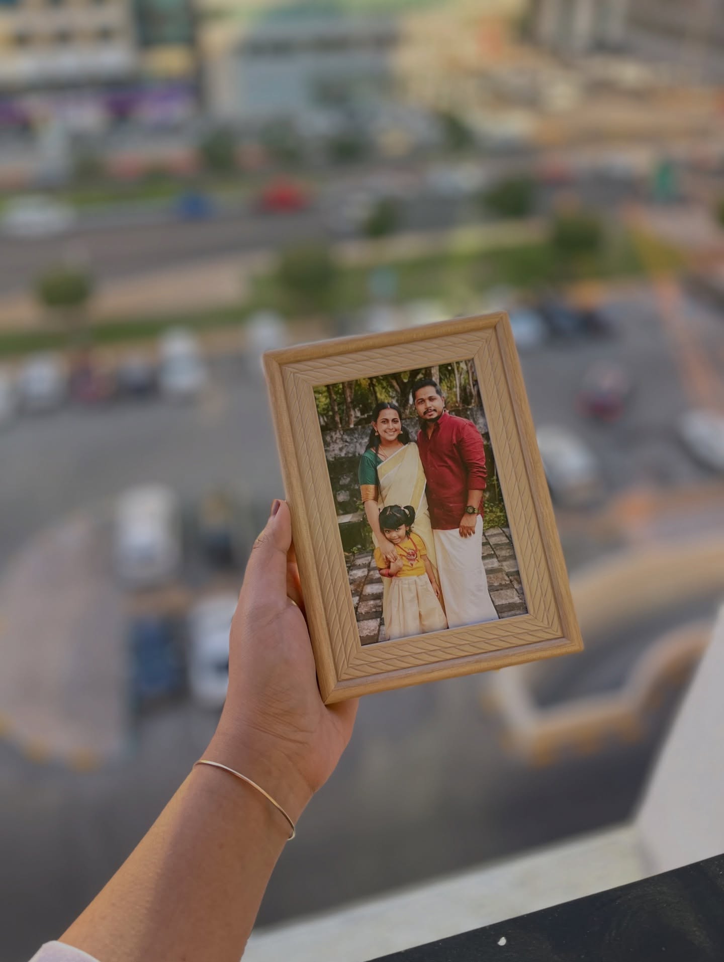 A classic wooden photo frame personalized with your favourite family portrait, a timeless just-because keepsake.