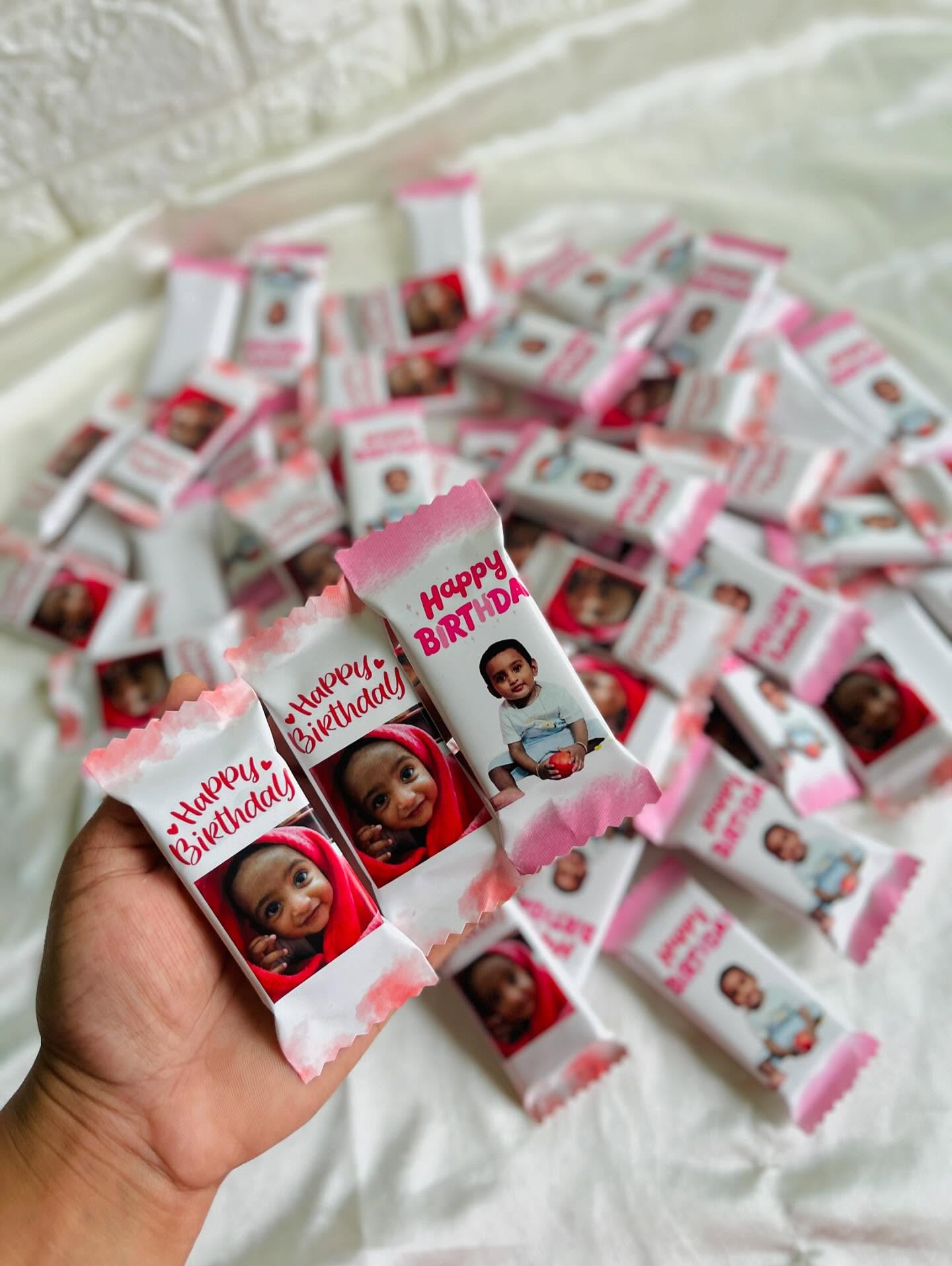 A generous stack of mini chocolate bars individually wrapped with your child's photo and a cheerful Happy Birthday message.