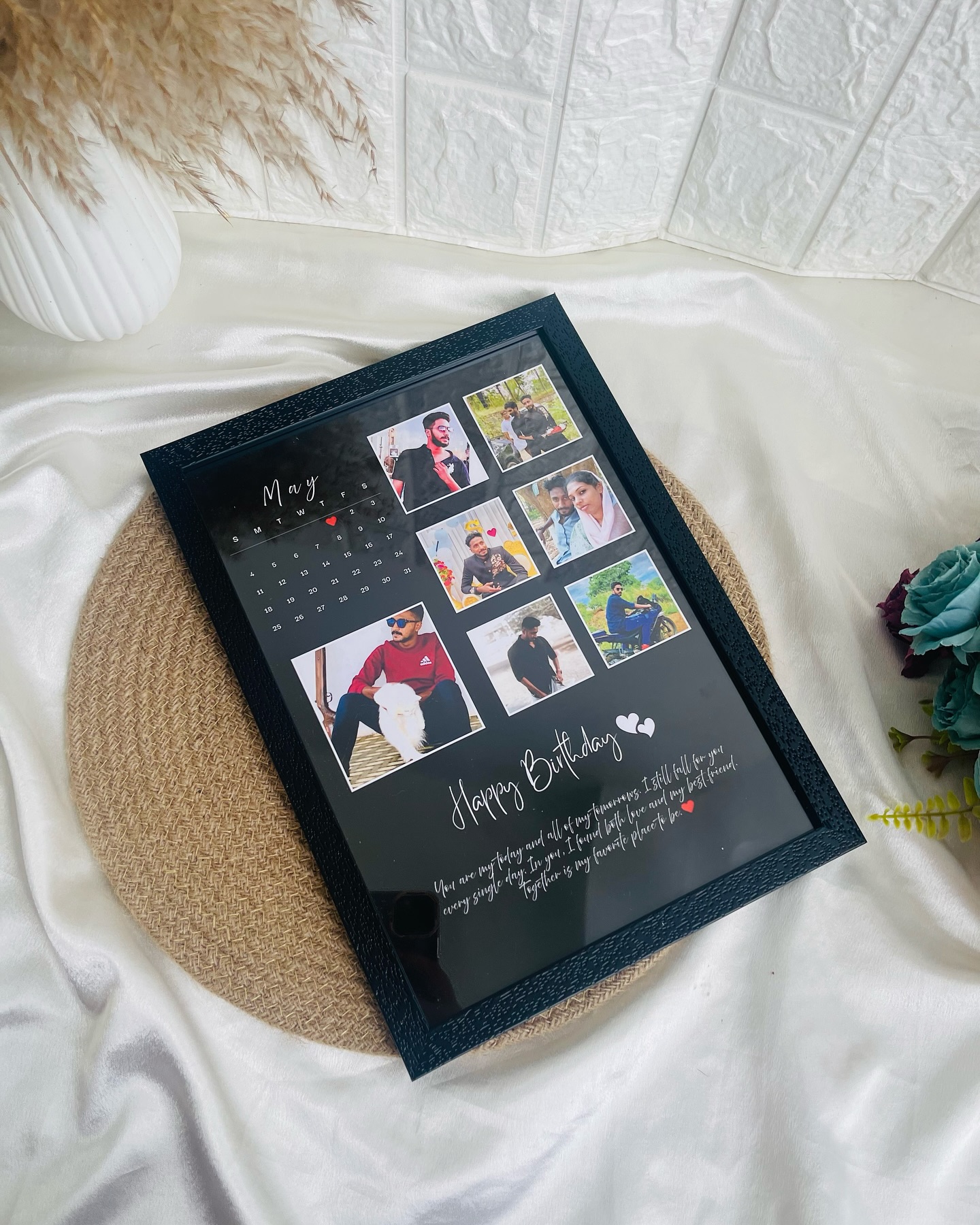 A black frame combining a monthly calendar, multiple personal photos, and a heartfelt birthday message.