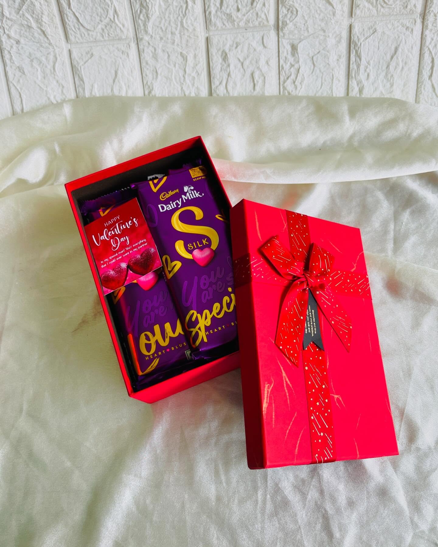 Custom-wrapped chocolate bars printed with a favorite photo and a sweet personal message.