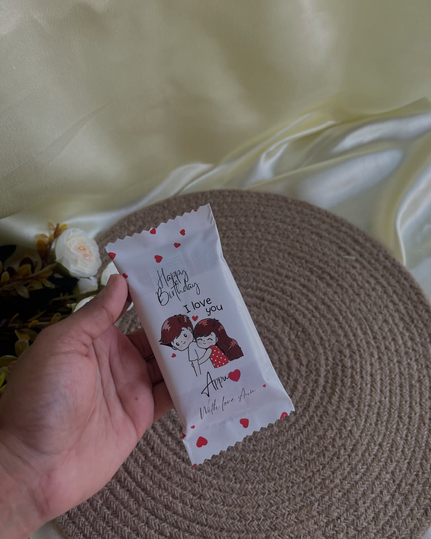 A single chocolate bar wrapped in a custom illustrated design with your own birthday message, a sweet little surprise.