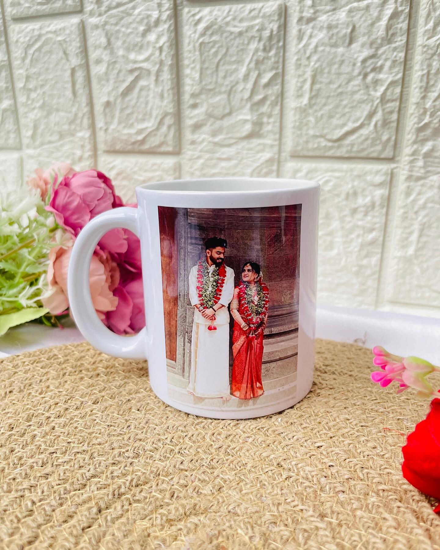 A ceramic mug custom-printed with a beautiful wedding portrait, a sweet everyday reminder of the big day.