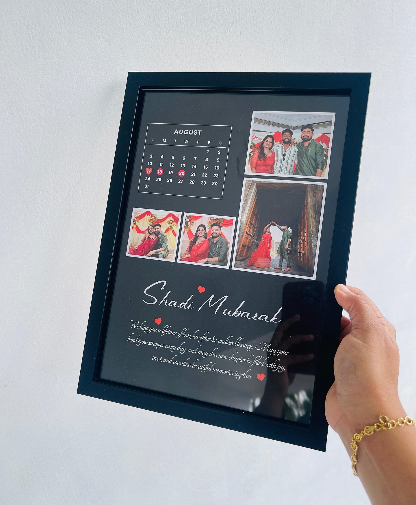 A framed wedding photo collage with a calendar marking the big day and a 'Shadi Mubarak' message.